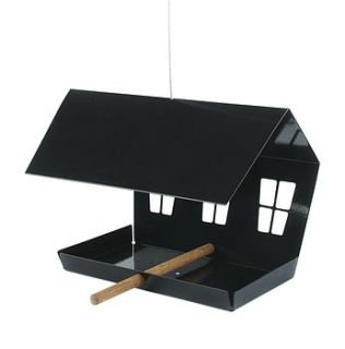 Our large bird feeder enables you to feed the birds while adding style