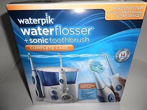 Waterpik Waterflosser Sonic Toothbrush Complete Care WP 910W System Kit New