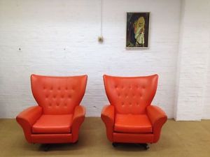 A RARE Pair of Bright Orange Swivel Arm Chairs James Bond Chair