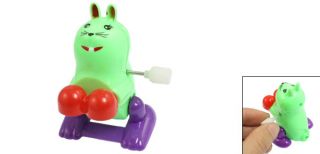 Child Playing Clockwork Wind Up Plastic Mouse Toy Green Purple Red