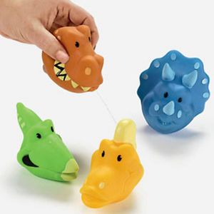 4 Dinosaur Squirts Kids Birthday Party Favors Pool Bath Tub Toys Cake Toppers